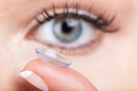 Contact lenses eye and fingertip