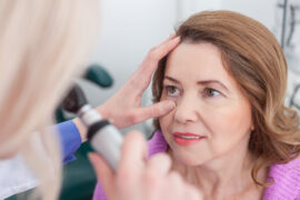 Older woman having her eyes examined