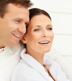 Man and woman sitting close together