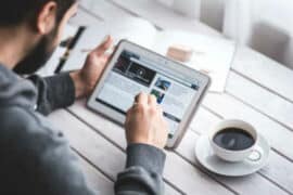 Man looking at a tablet